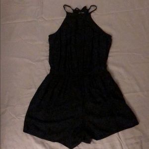 Adorable black romper.